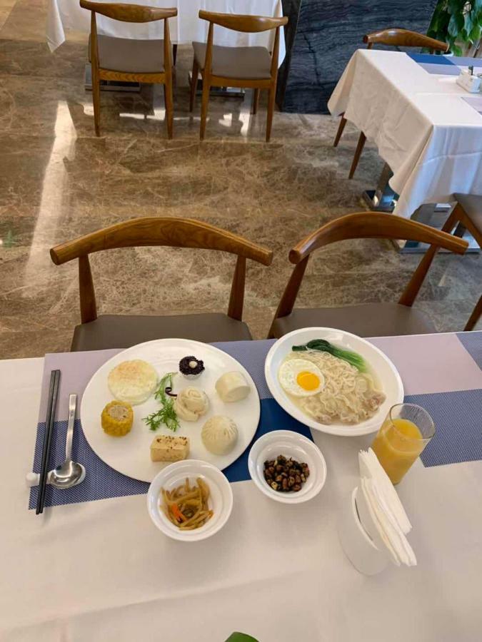 Four Seasons Rayli Hotel Ningbo Exteriör bild